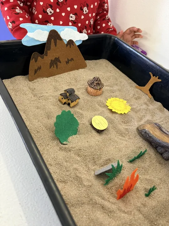 A dinosaur-themed sensory activity